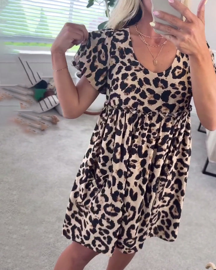 Trendy dress with leopard print and short sleeves